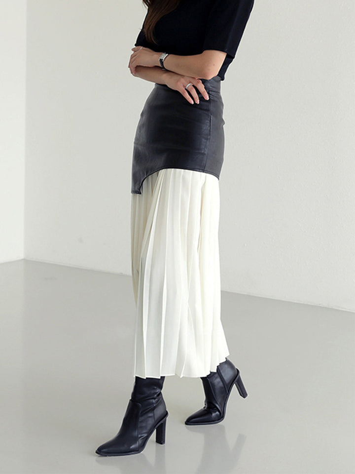 Макси пола с асиметричен дизайн от изкуствена кожа и плетени акценти